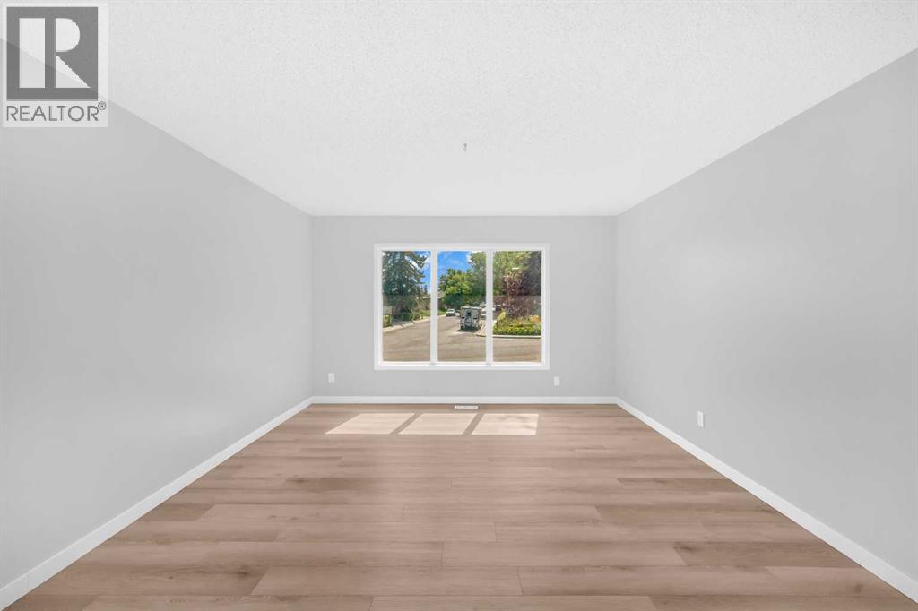 804 71 Avenue Nw, Calgary, Alberta  T2K 0N3 - Photo 9 - A2252343