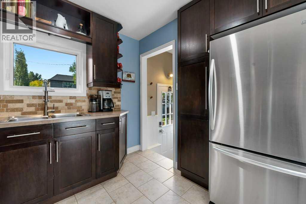 1131 15 Avenue Ne, Calgary, Alberta  T2E 1J4 - Photo 11 - A2256414
