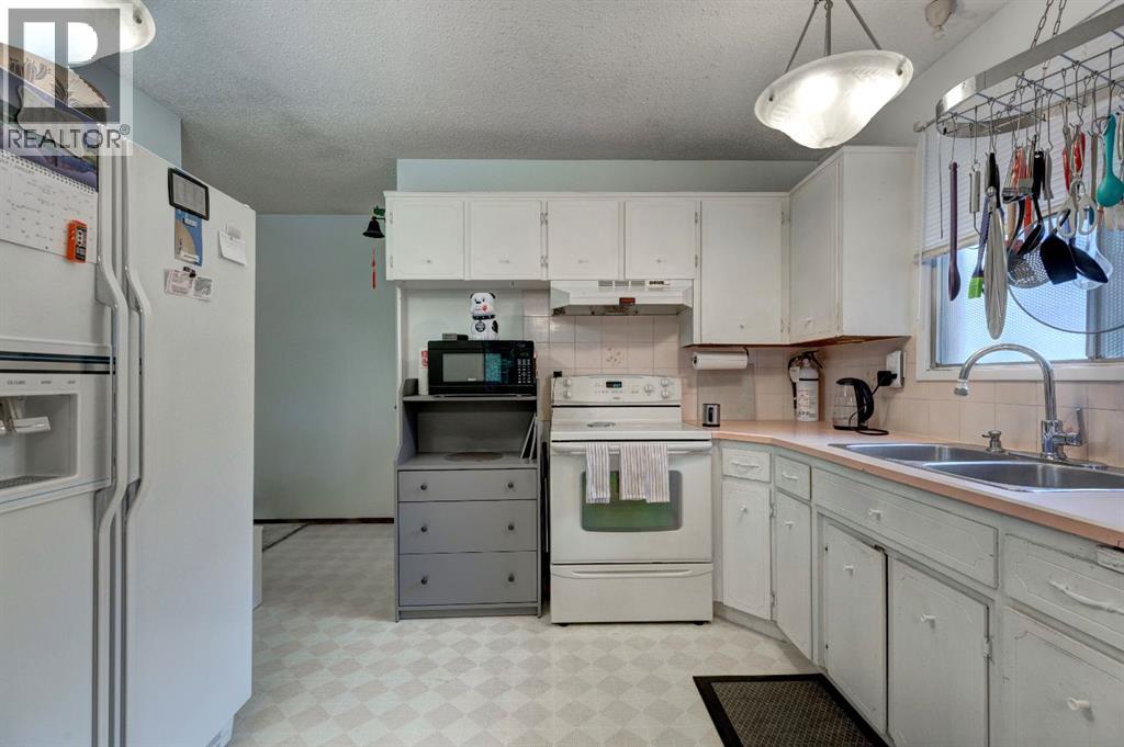 628 Cantrell Drive Sw, Calgary, Alberta  T2W 1W7 - Photo 10 - A2232874