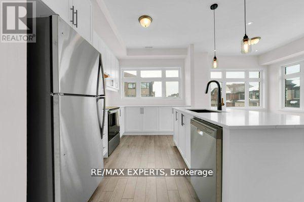 1537 Moonseed Place, Milton, Ontario  L9T 7E7 - Photo 4 - W12443281