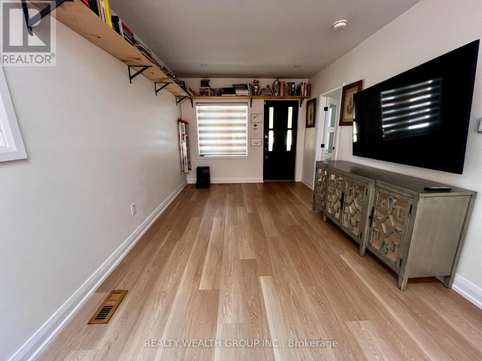 166 Harvie Avenue, Toronto, Ontario  M6E 4K3 - Photo 7 - W12443009