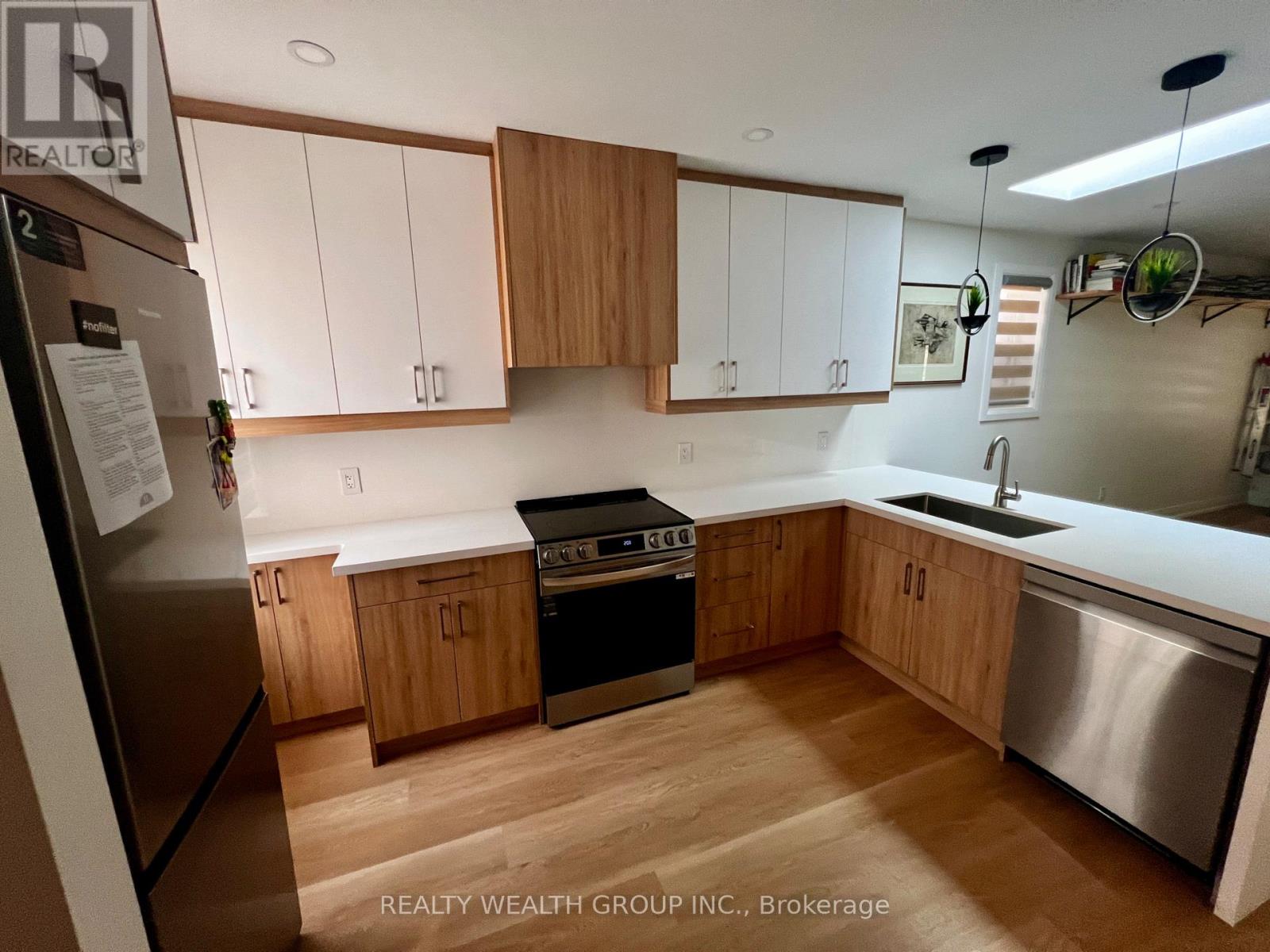 166 Harvie Avenue, Toronto, Ontario  M6E 4K3 - Photo 5 - W12443009