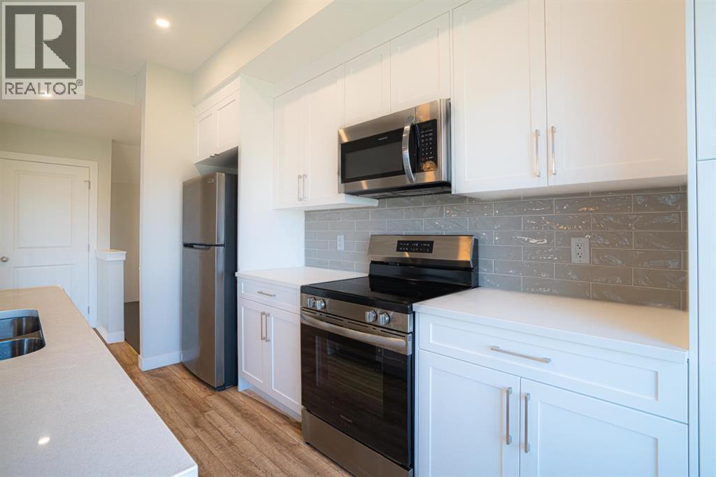 358 Canals Crossing Sw, Airdrie, Alberta  T4B 3J4 - Photo 7 - A2258611