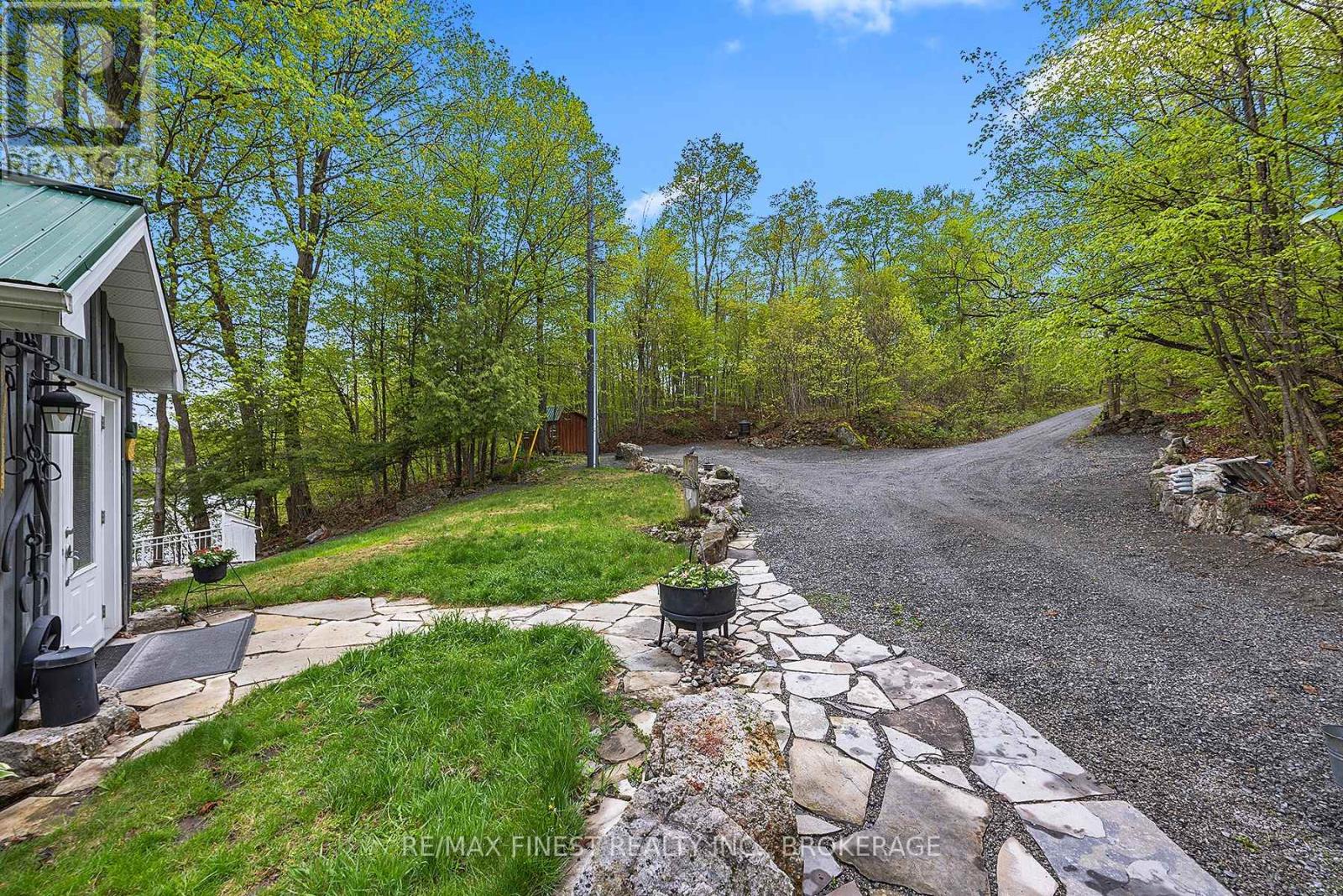 8126 Perth Road, South Frontenac, Ontario  K0H 2L0 - Photo 6 - X12443582