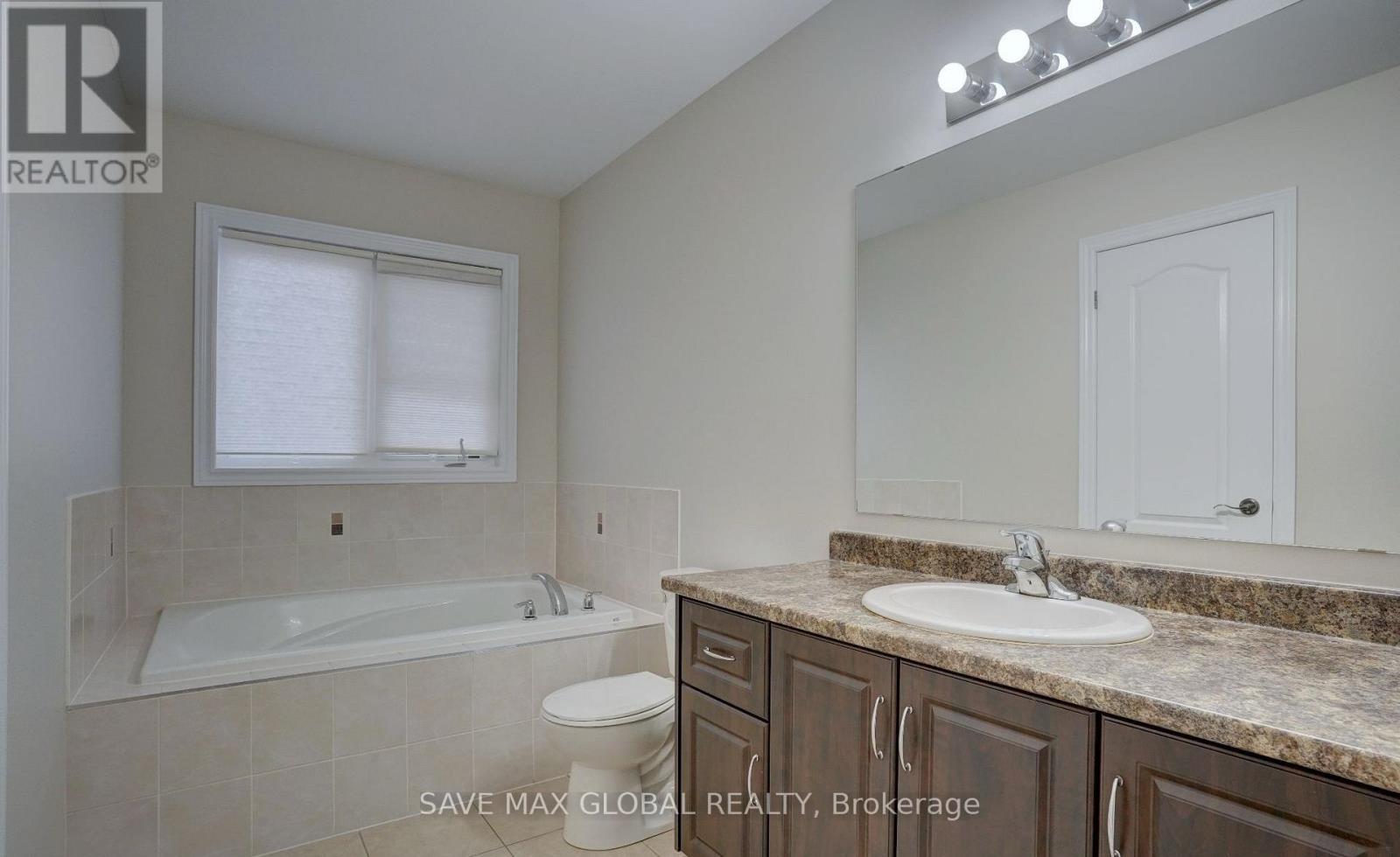 62 Ebury Drive, Brampton, Ontario  L6X 5M7 - Photo 5 - W12443385