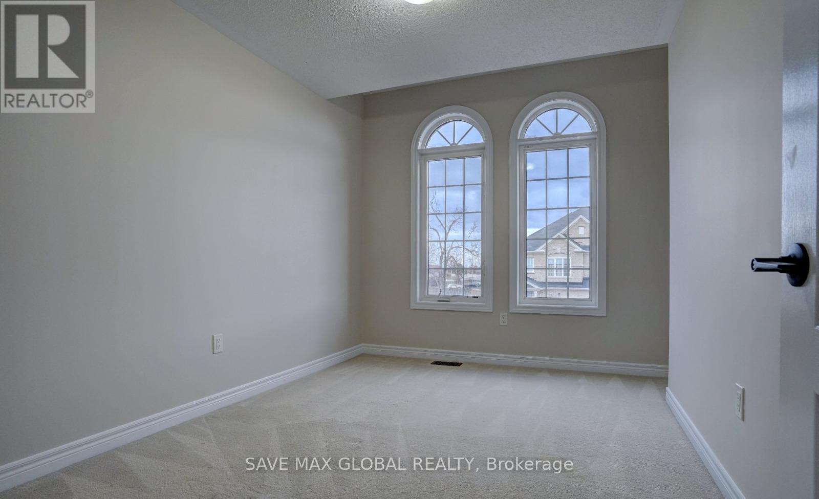 62 Ebury Drive, Brampton, Ontario  L6X 5M7 - Photo 7 - W12443385