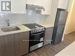 107 - 130 Canon Jackson Drive, Toronto, Ontario  M6M 0B7 - Photo 6 - W12443468