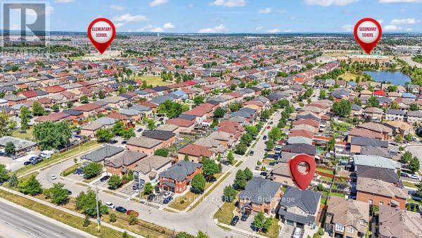 81 Roadmaster Lane, Brampton (Fletcher's Meadow), Ontario  L7A 3A8 - Photo 34 - W12443476
