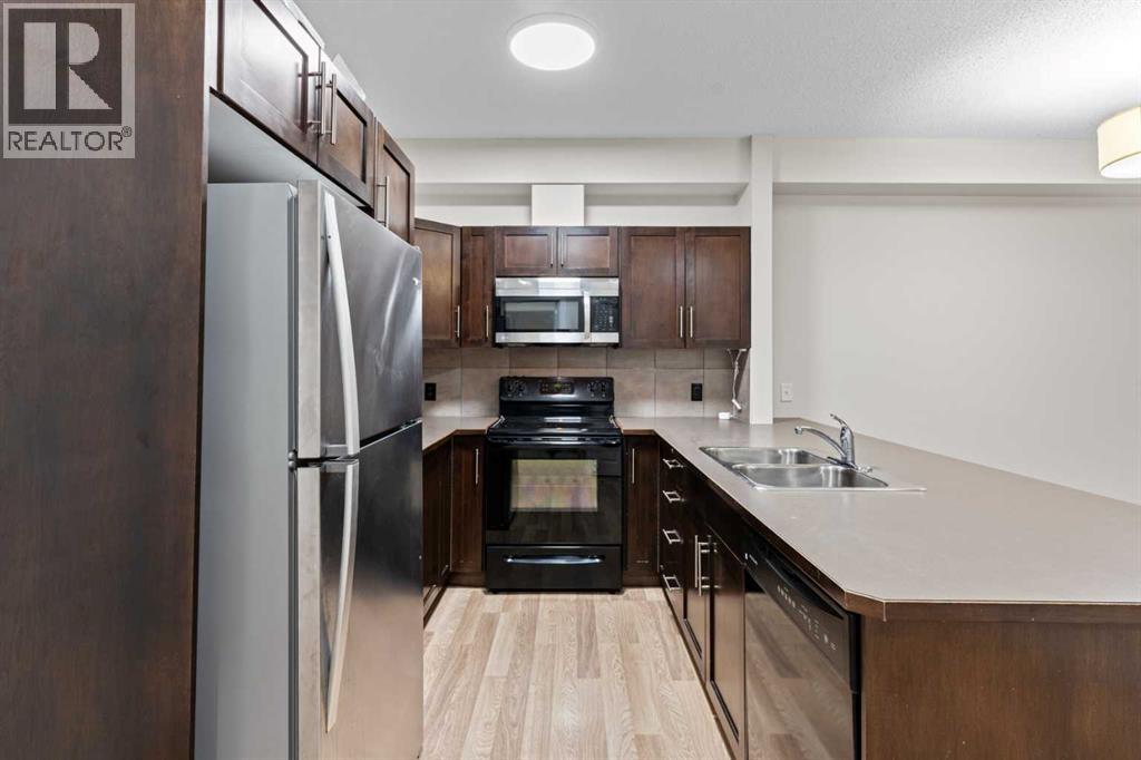 109, 48 Panatella Road Nw, Calgary, Alberta  T3K 0V4 - Photo 4 - A2261670