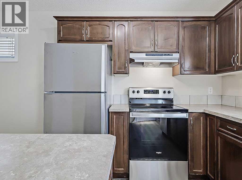 483 Cimarron Boulevard, Okotoks, Alberta  T1S 0J6 - Photo 7 - A2239117