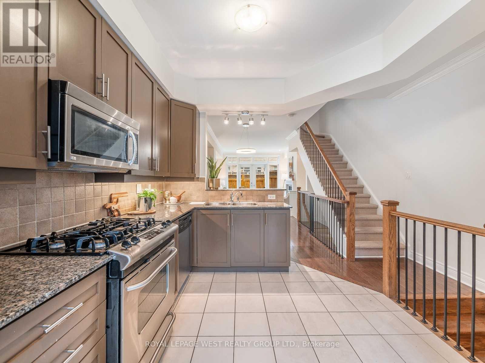 56 Furrow Lane, Toronto, Ontario  M8Z 0A3 - Photo 3 - W12443705