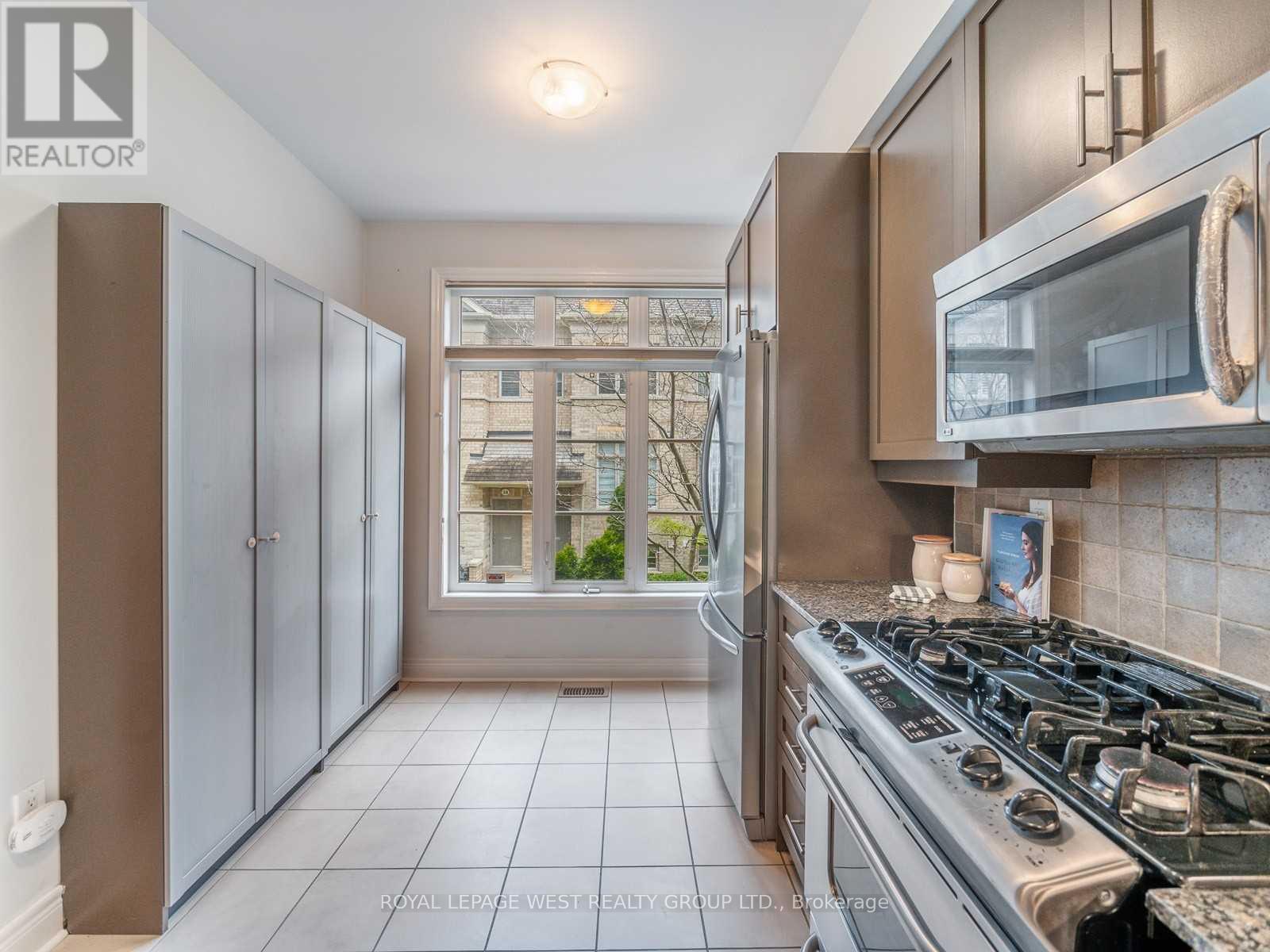 56 Furrow Lane, Toronto, Ontario  M8Z 0A3 - Photo 4 - W12443705