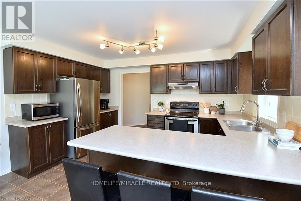 97 Barrett Avenue, Brantford, Ontario  N3S 0B4 - Photo 8 - X12443699