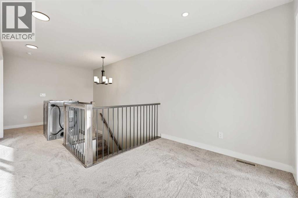 2194 Bayview Drive Sw, Airdrie, Alberta  T4B 5N4 - Photo 9 - A2242797