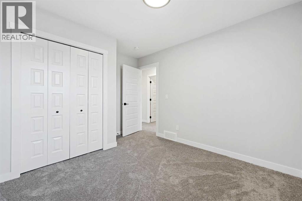 2194 Bayview Drive Sw, Airdrie, Alberta  T4B 5N4 - Photo 16 - A2242797