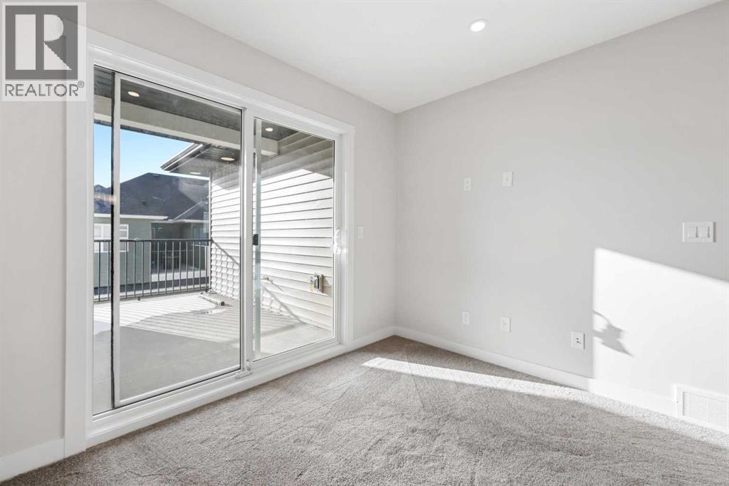 2194 Bayview Drive Sw, Airdrie, Alberta  T4B 5N4 - Photo 10 - A2242797