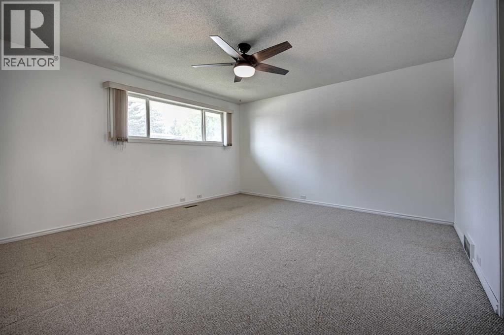 1004 Cantabrian Drive Sw, Calgary, Alberta  T2W 1L7 - Photo 12 - A2261935