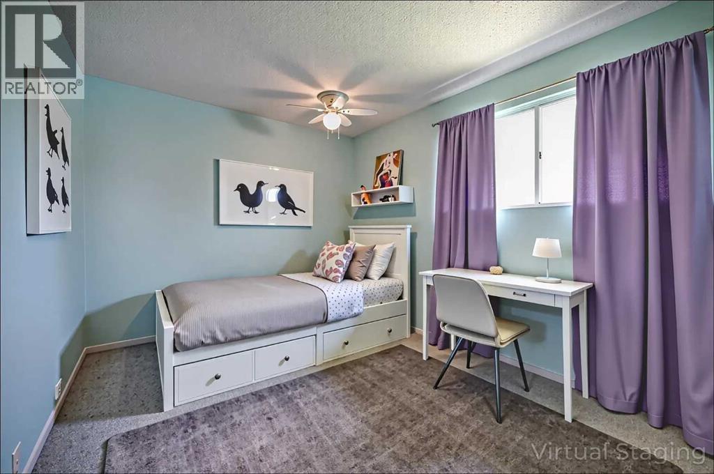 1004 Cantabrian Drive Sw, Calgary, Alberta  T2W 1L7 - Photo 16 - A2261935