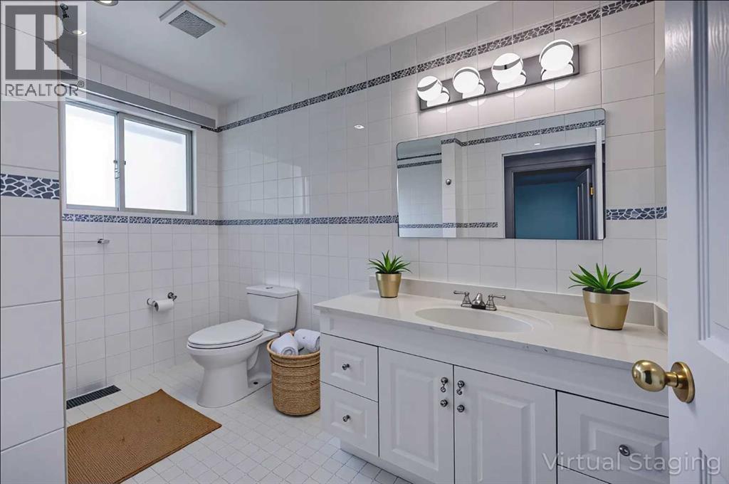 1004 Cantabrian Drive Sw, Calgary, Alberta  T2W 1L7 - Photo 18 - A2261935