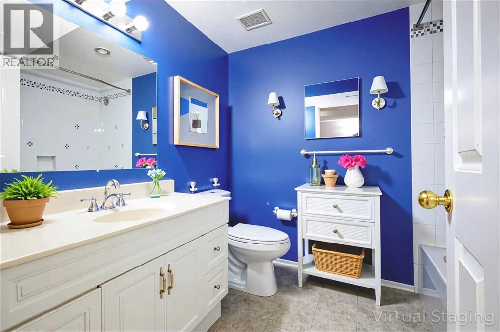 1004 Cantabrian Drive Sw, Calgary, Alberta  T2W 1L7 - Photo 24 - A2261935
