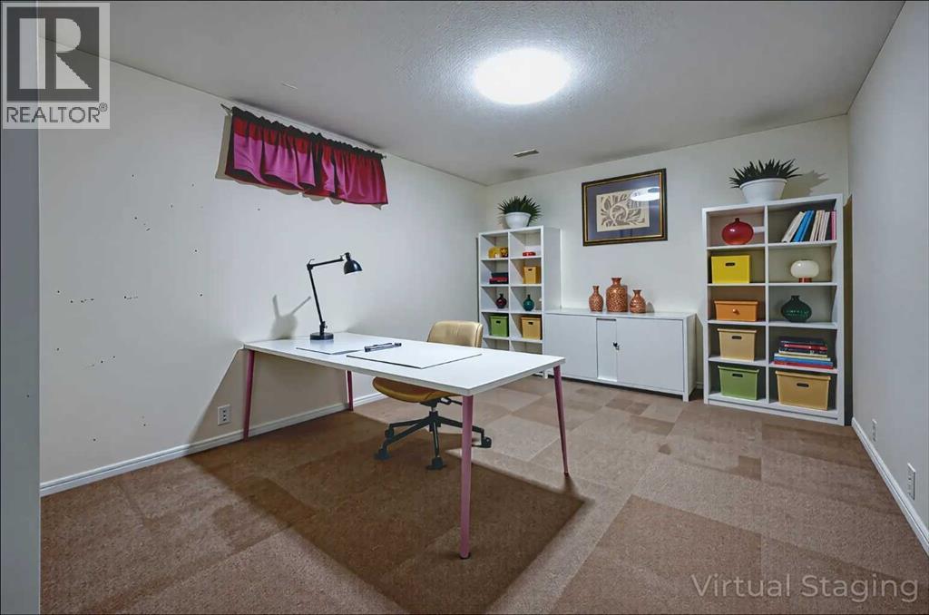 1004 Cantabrian Drive Sw, Calgary, Alberta  T2W 1L7 - Photo 27 - A2261935