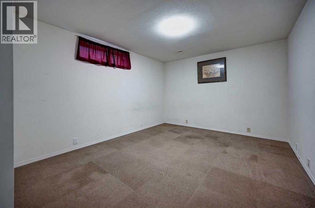 1004 Cantabrian Drive Sw, Calgary, Alberta  T2W 1L7 - Photo 28 - A2261935