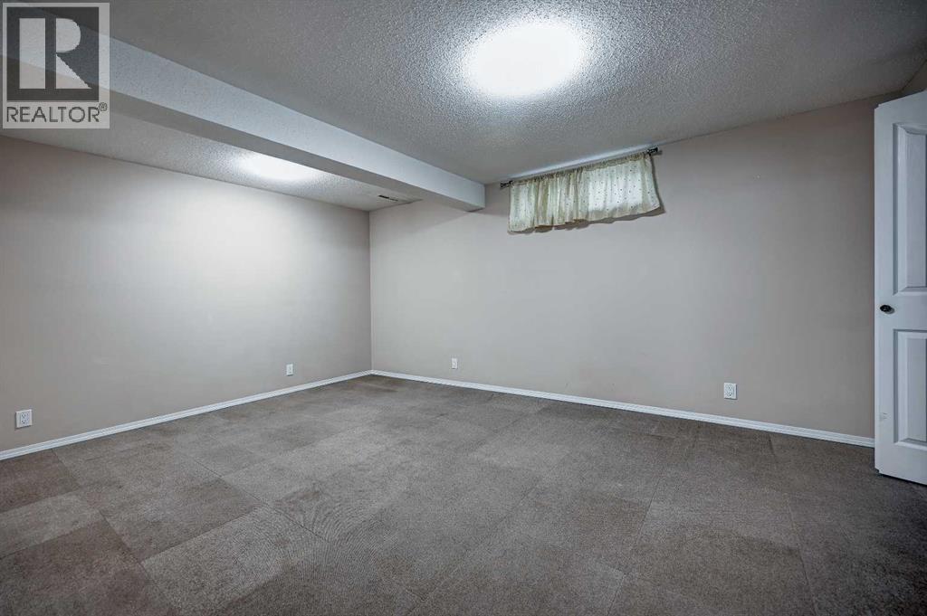 1004 Cantabrian Drive Sw, Calgary, Alberta  T2W 1L7 - Photo 30 - A2261935