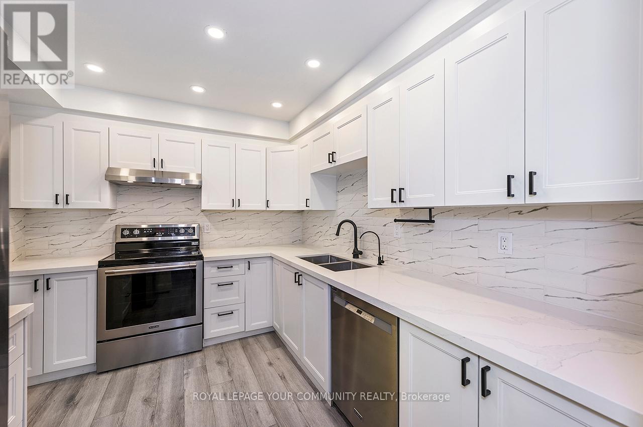 102 - 2120 Rathburn Road E, Mississauga, Ontario  L4W 2S8 - Photo 2 - W12443818