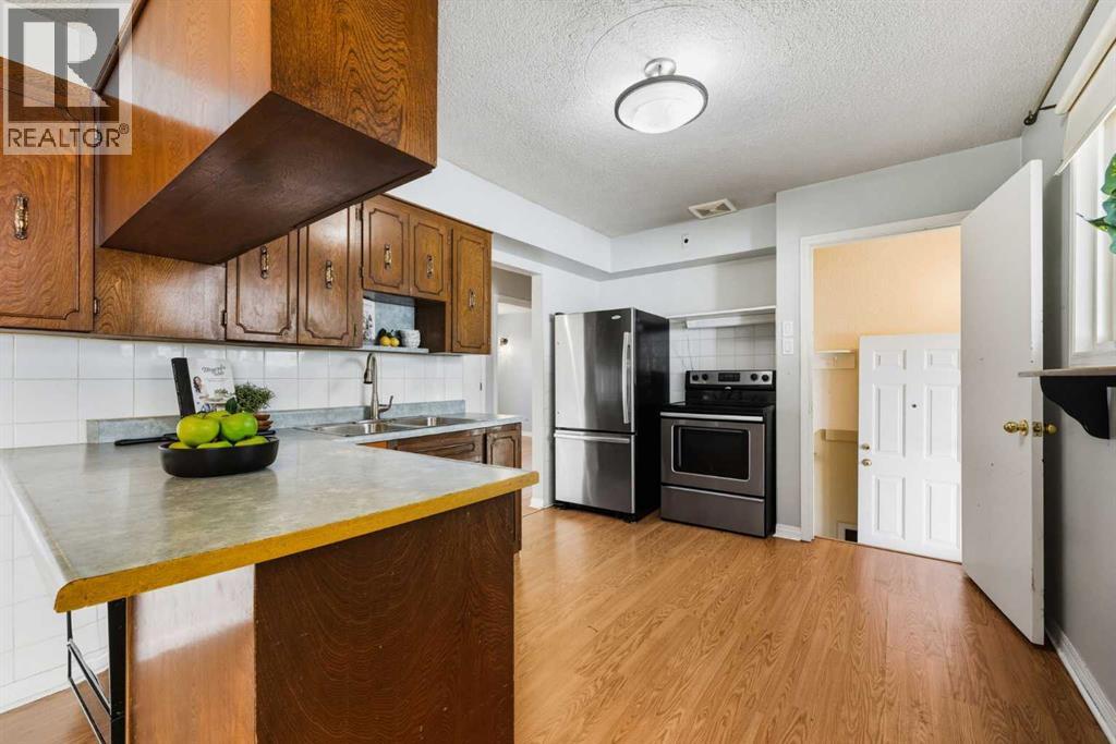 1048 39 Avenue Nw, Calgary, Alberta  T2K 0E1 - Photo 9 - A2259464