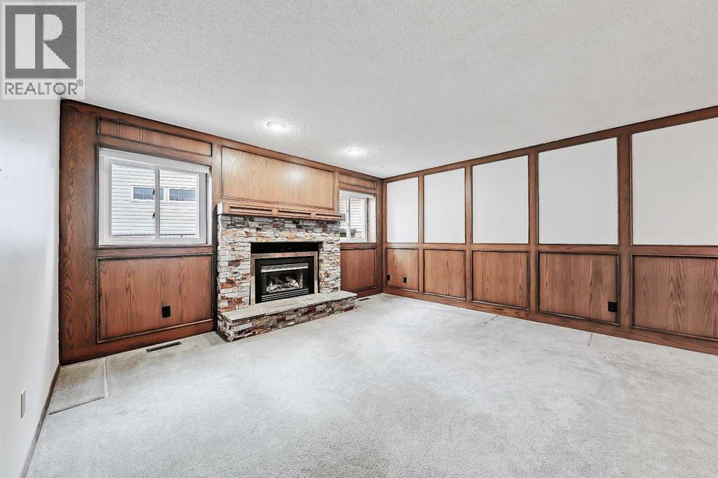 40 Woodview Court Sw, Calgary, Alberta  T2W 4X4 - Photo 21 - A2261139