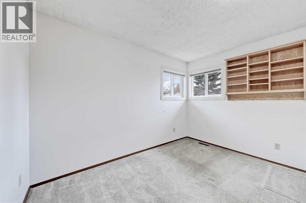 40 Woodview Court Sw, Calgary, Alberta  T2W 4X4 - Photo 32 - A2261139