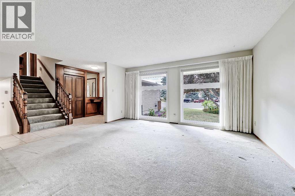 40 Woodview Court Sw, Calgary, Alberta  T2W 4X4 - Photo 10 - A2261139