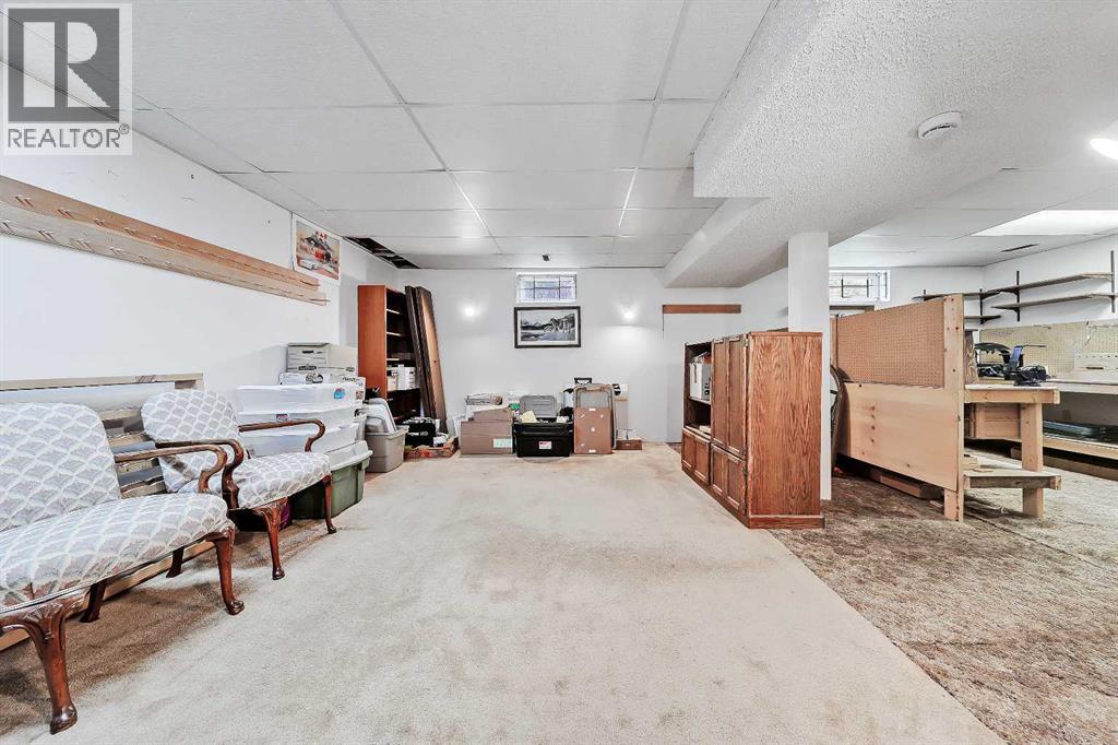 40 Woodview Court Sw, Calgary, Alberta  T2W 4X4 - Photo 37 - A2261139
