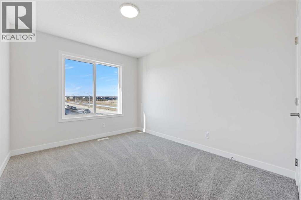 329 Ambleton Drive Nw, Calgary, Alberta  T3P 2B6 - Photo 11 - A2202661