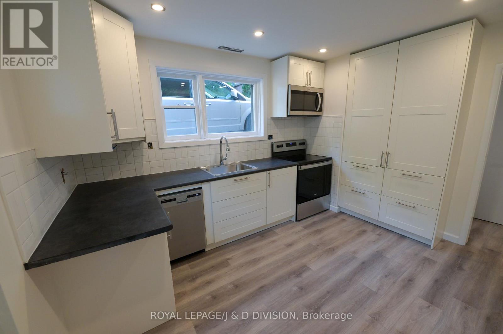 1 - 136 Windermere Avenue, Toronto, Ontario  M6S 3J6 - Photo 6 - W12444084