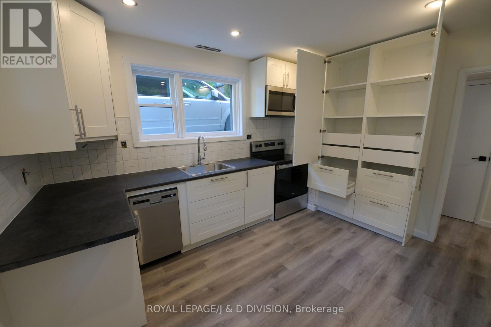 1 - 136 Windermere Avenue, Toronto, Ontario  M6S 3J6 - Photo 7 - W12444084