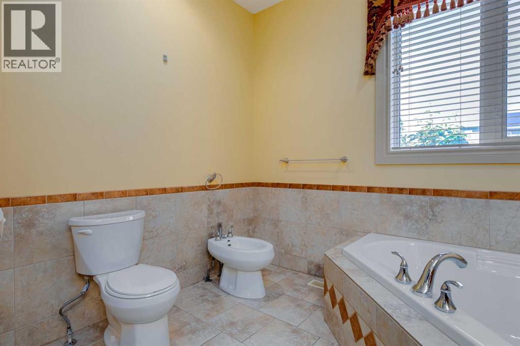 72 Panatella Manor Nw, Calgary, Alberta  T3K 0A7 - Photo 34 - A2230187
