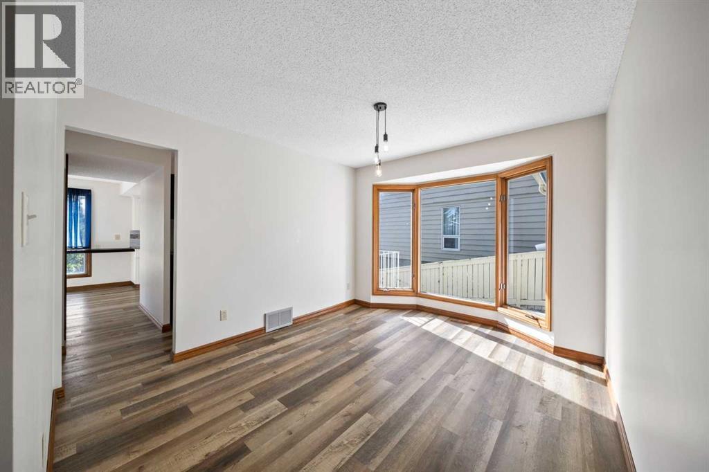 36 Strathlorne Crescent Sw, Calgary, Alberta  T3H 1M8 - Photo 8 - A2261749