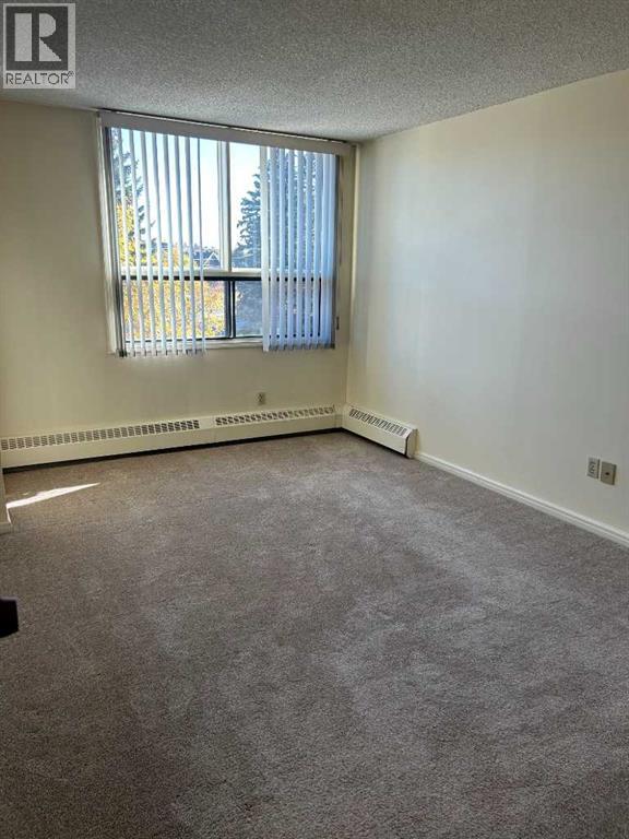 305, 145 Point Drive Nw, Calgary, Alberta  T3B 4W1 - Photo 24 - A2240036