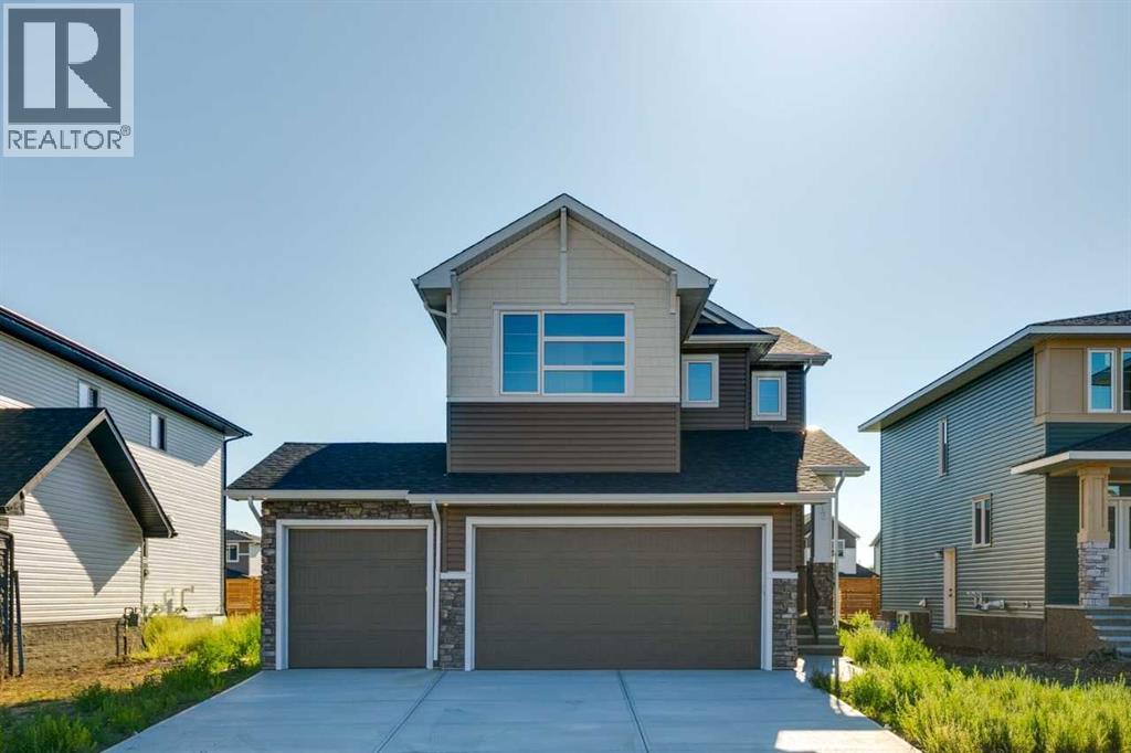 72 Dawson Wharf Mount, Chestermere, Alberta  T1X 2X6 - Photo 2 - A2262127