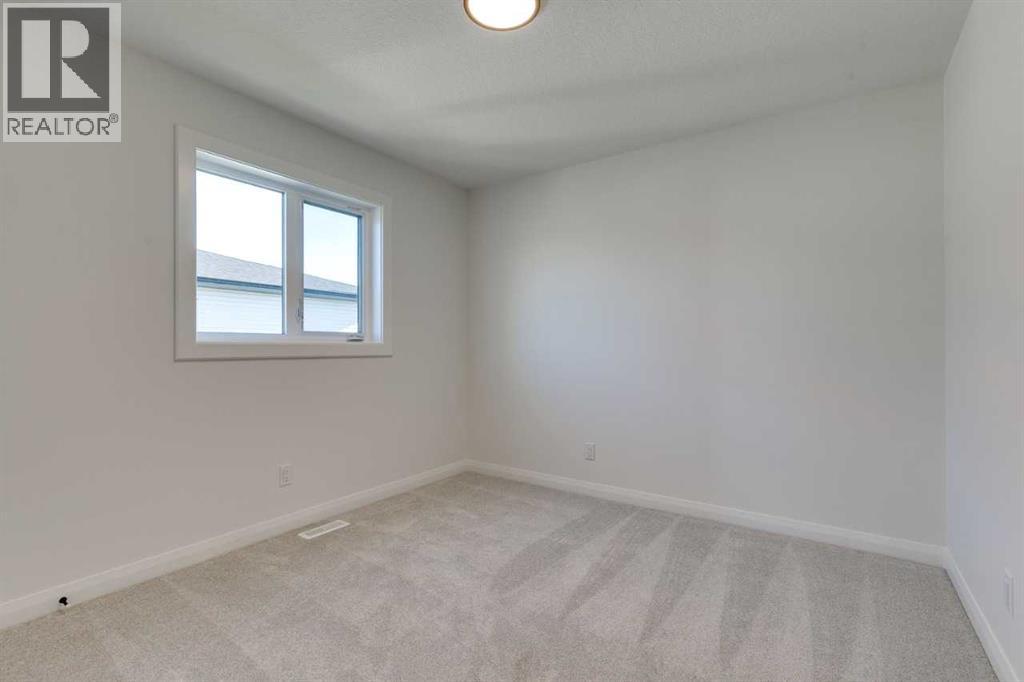 72 Dawson Wharf Mount, Chestermere, Alberta  T1X 2X6 - Photo 23 - A2262127