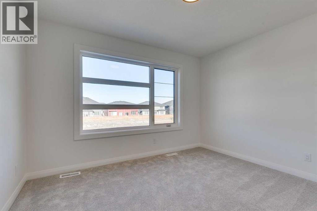 72 Dawson Wharf Mount, Chestermere, Alberta  T1X 2X6 - Photo 25 - A2262127