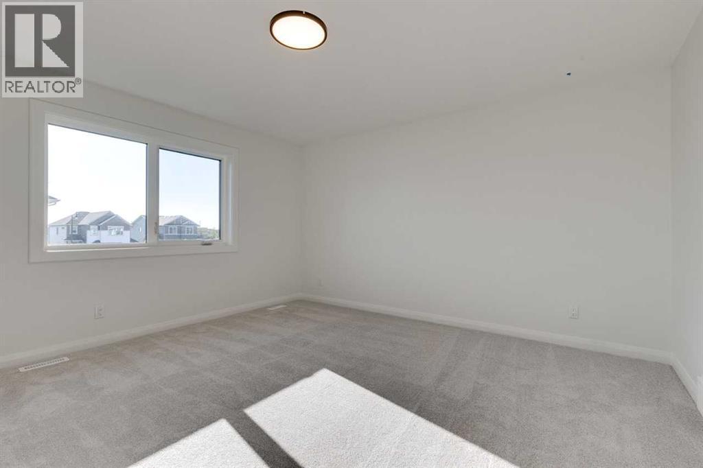 72 Dawson Wharf Mount, Chestermere, Alberta  T1X 2X6 - Photo 27 - A2262127