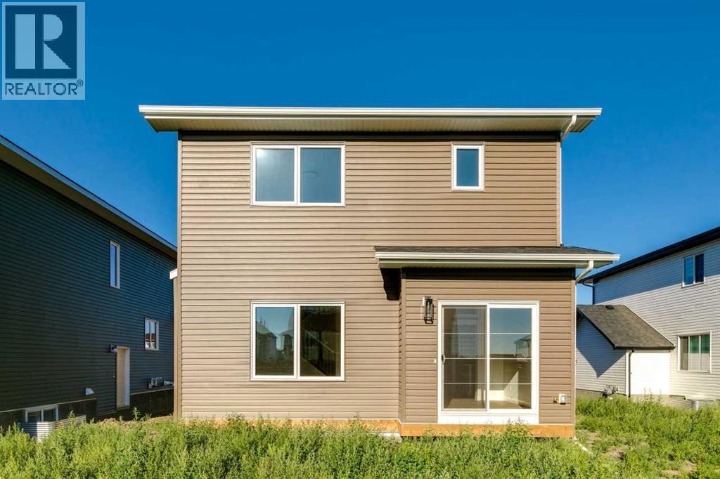 72 Dawson Wharf Mount, Chestermere, Alberta  T1X 2X6 - Photo 3 - A2262127