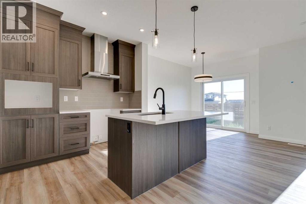 72 Dawson Wharf Mount, Chestermere, Alberta  T1X 2X6 - Photo 6 - A2262127