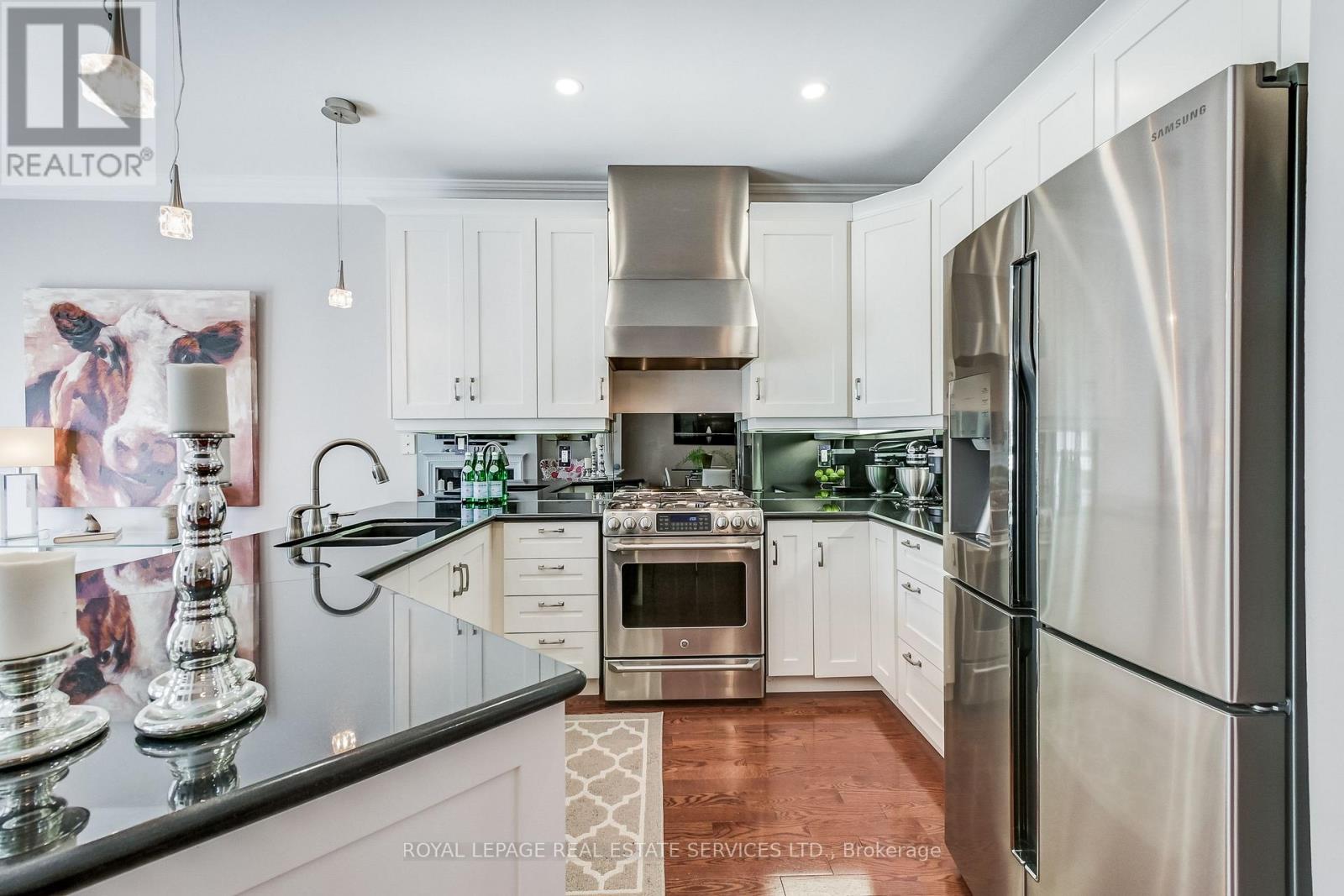 1242 Agram Drive, Oakville, Ontario  L6H 7N9 - Photo 6 - W12444387