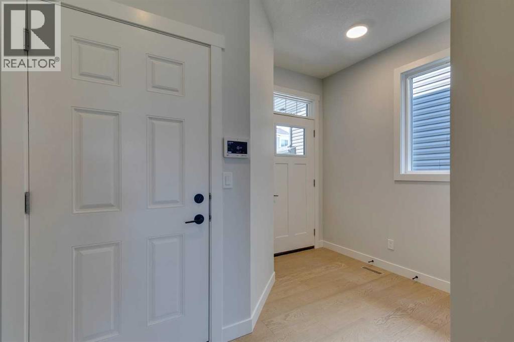 126 Belmont Passage Sw, Calgary, Alberta  T2X 4W2 - Photo 7 - A2217310