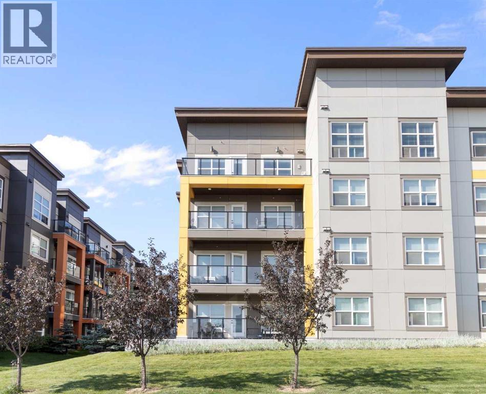 405, 19661 40 Street Se, Calgary, Alberta  T3M 3H3 - Photo 2 - A2257138