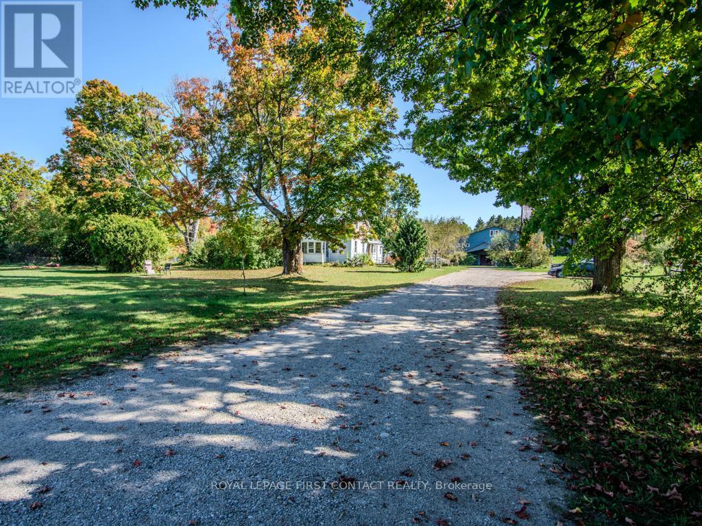 2041 Flos 4 Road W, Springwater, Ontario  L0L 2K0 - Photo 2 - S12444432