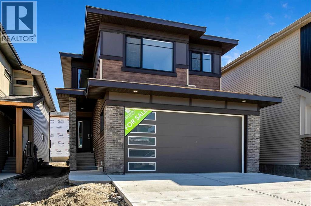 11 Heritage Link, Cochrane, Alberta  T4C 2J8 - Photo 1 - A2248171